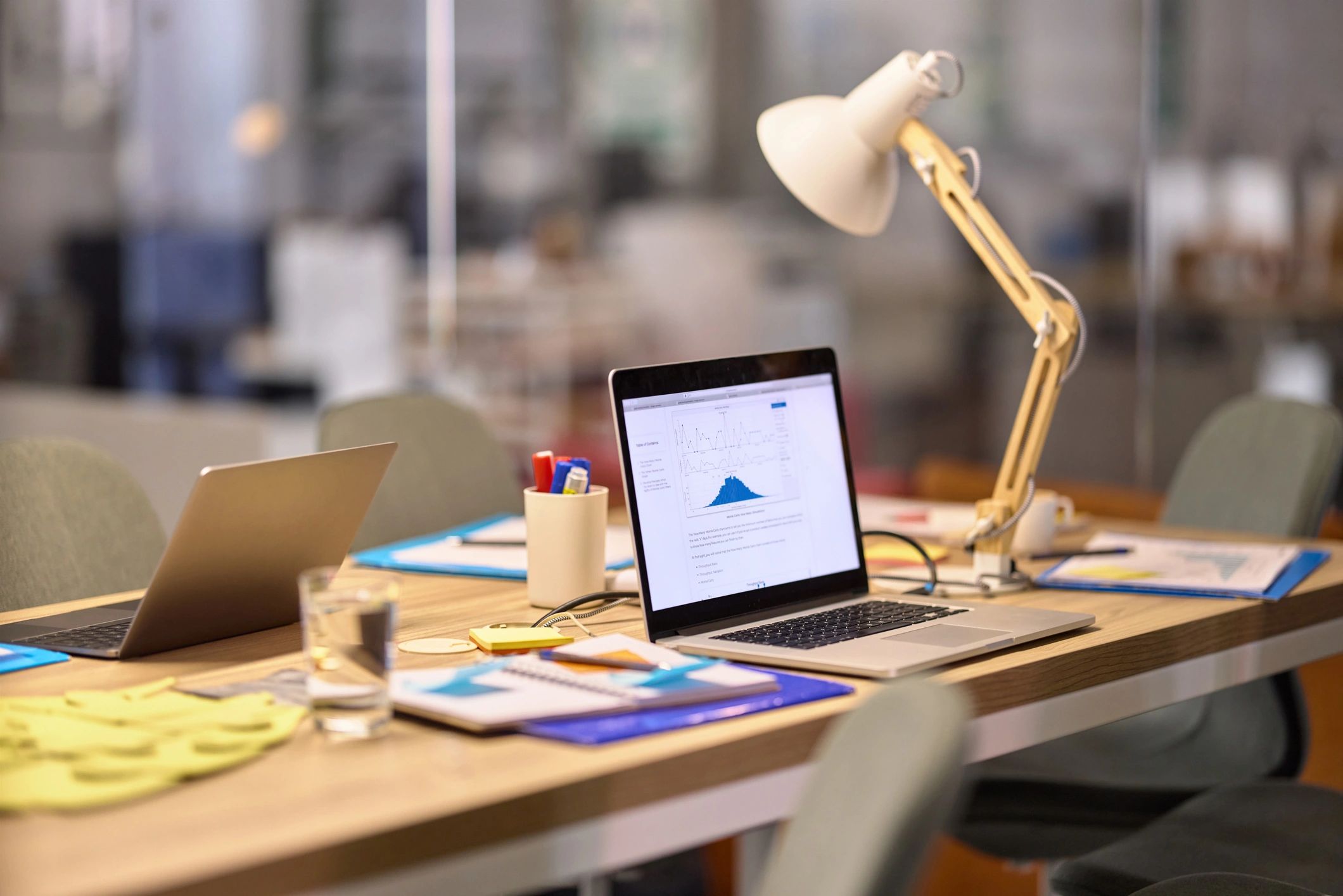 Laptop on a desk in a modern office workspace
